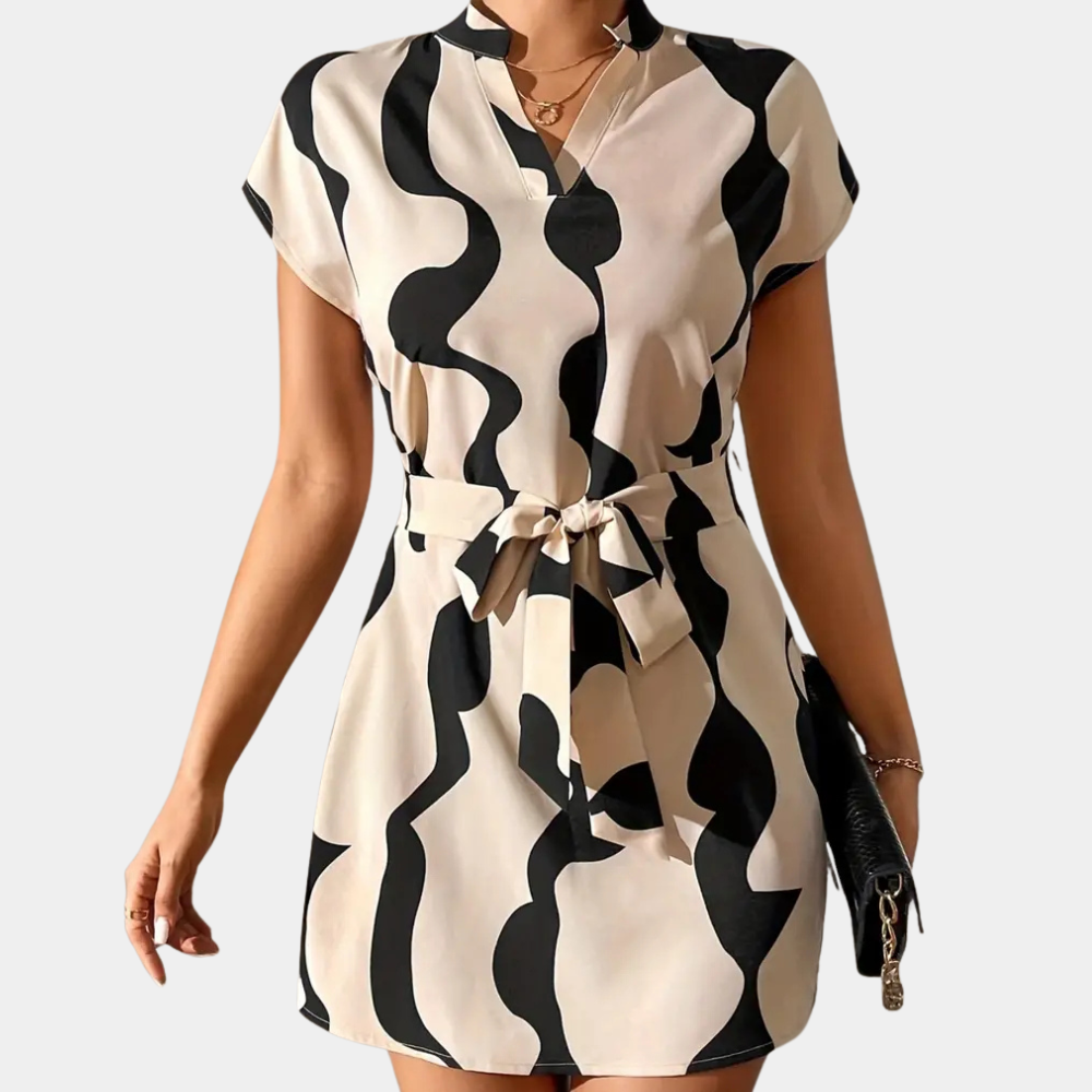 Flattering Elena beige mini dress for women, featuring a stylish belt. A trendy and elegant choice for any occasion.