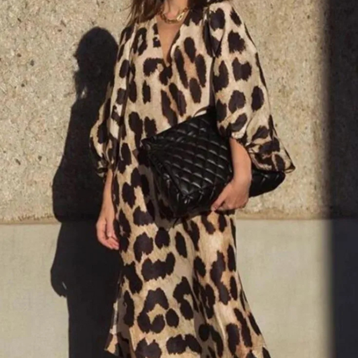 Comfortable women's loose-fit panther print midi dress, a stylish beige animal print for casual or evening wear.