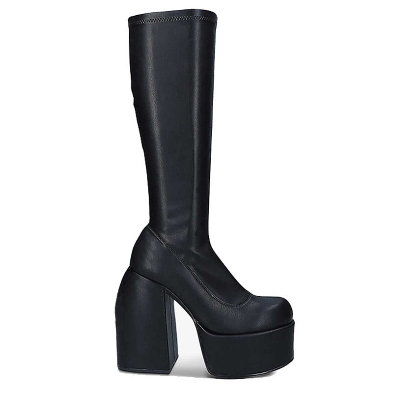 Stylish women's black heeled ankle boots, perfect for fashion-forward looks & versatile outfits.
