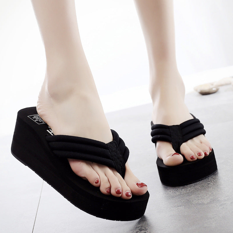 Stylish women's black orthopedic comfort slippers for foot pain relief. Supportive, ergonomic indoor-outdoor design.