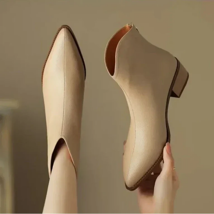 Women's modern pointed toe ankle boots, offering stylish comfort for active everyday movement.