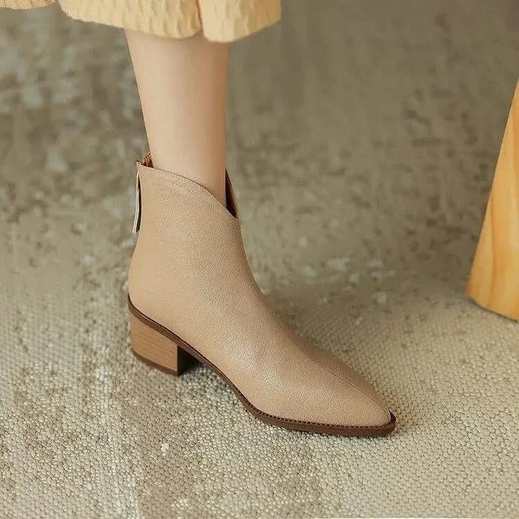 Comfort-focused women's pointed toe ankle boots, designed for stylish all-day wear during fall.