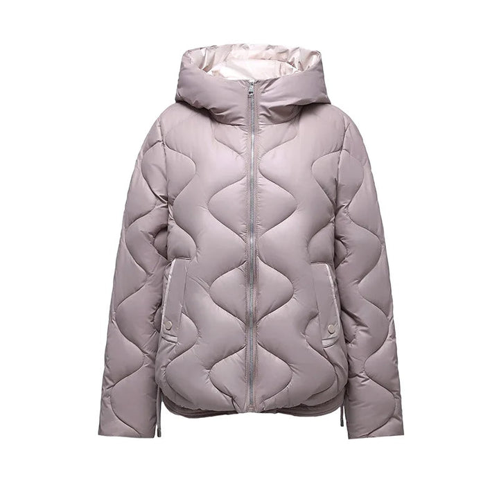 Lightweight yet warm women's puffer jacket, perfect for layering and staying cozy in chilly weather.