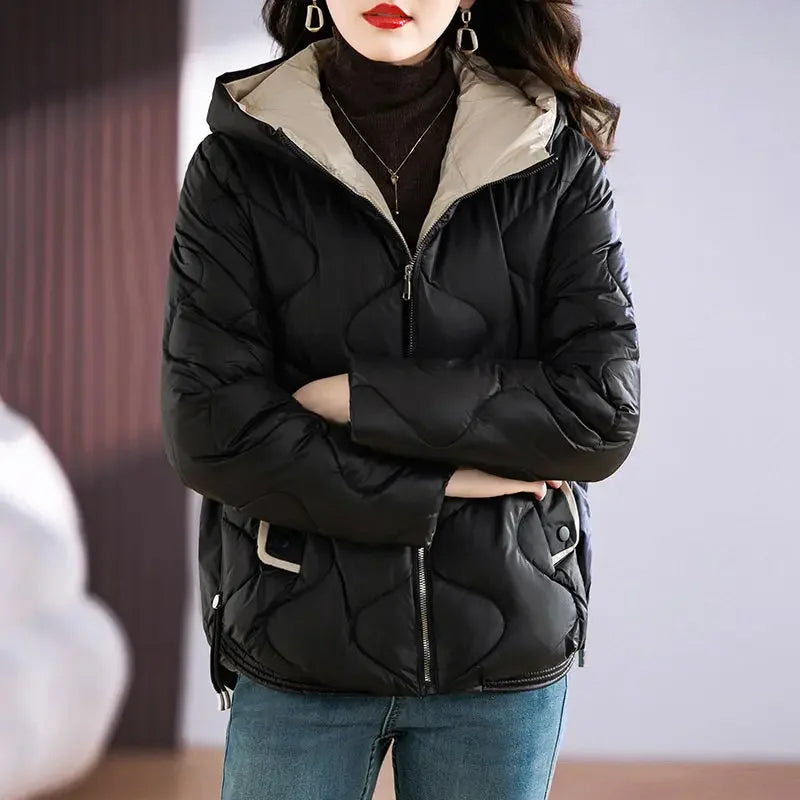 Chic women's fall fashion puffer jacket, with a flattering fit and warm, cozy insulation.