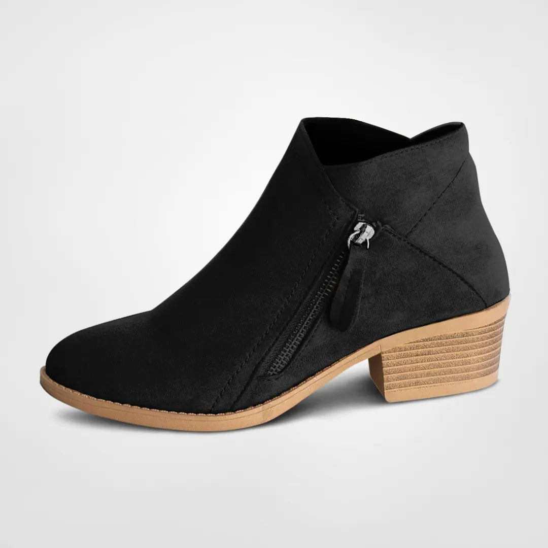 Stylish women's black zipper ankle boots with a comfortable low heel, perfect for fall and winter fashion.