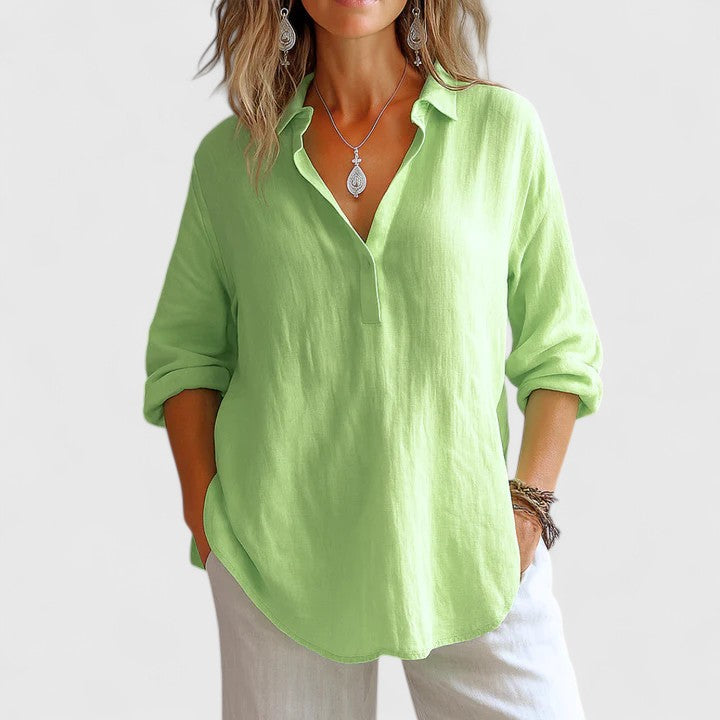 Chic white women's long sleeve blouse, versatile for casual or elegant occasions. Comfortable everyday fashion.