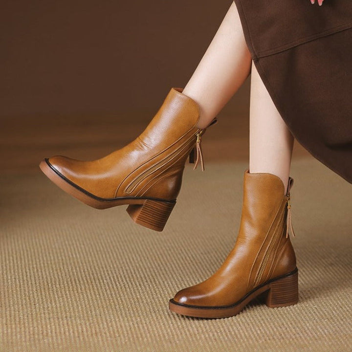 Elegant women's high-heel ankle boots, a fashionable choice for fall & winter outfits and stylish fashion footwear.