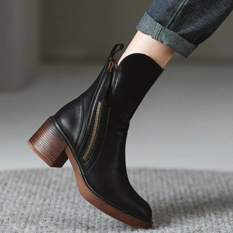 Trendy women's high-heel ankle boots, perfect for enhancing fall trends and adding elegance to winter fashion.