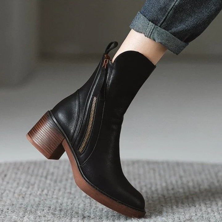 Trendy women's high-heel ankle boots, perfect for enhancing fall trends and adding elegance to winter fashion.