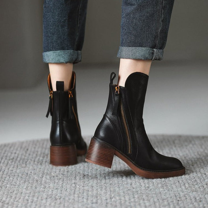 Stylish high-heel ankle boots for women, perfect for both fall fashion trends and elegant winter outfits.