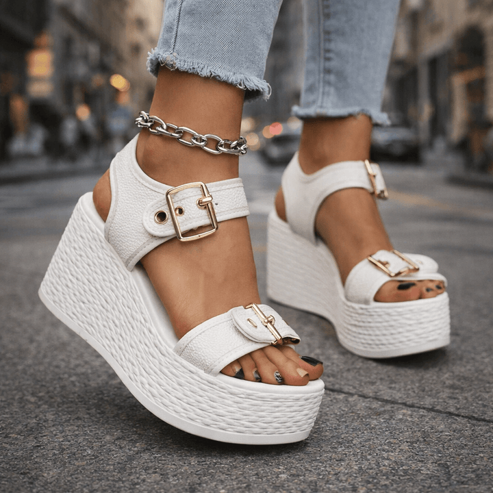 Trendy women's buckle wedge platform sandals, essential summer footwear for chic, elevated style.