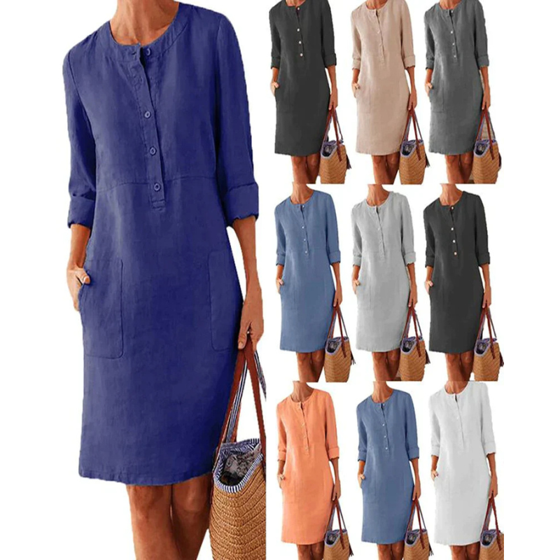 Comfortable women's everyday dress, knee-length with practical pockets & round neck. Versatile chic ladies fashion.