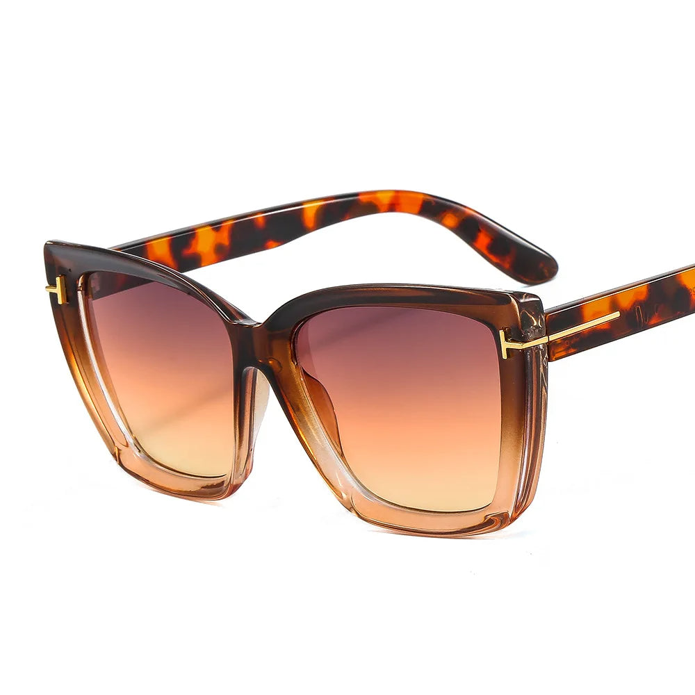 Close-up of elegant cat-eye sunglasses for women, gradient UV400 lenses, perfect summer accessory