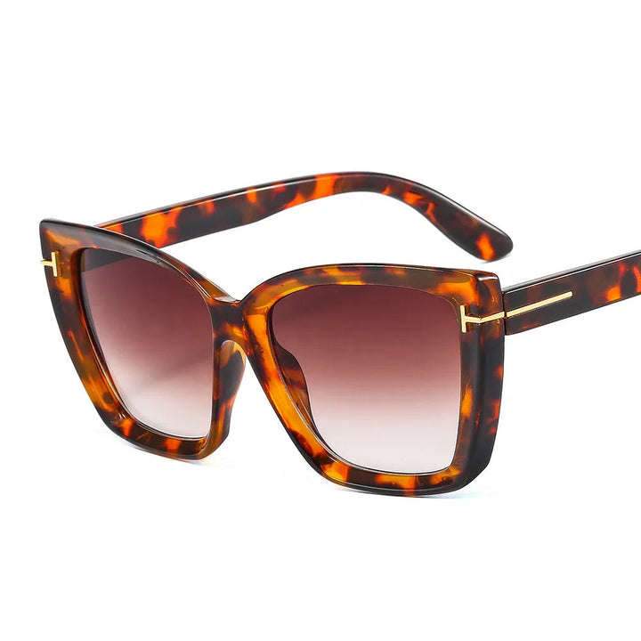 Fashionable cat-eye sunglasses with gradient UV400 lenses for women, stylish eyewear accessory