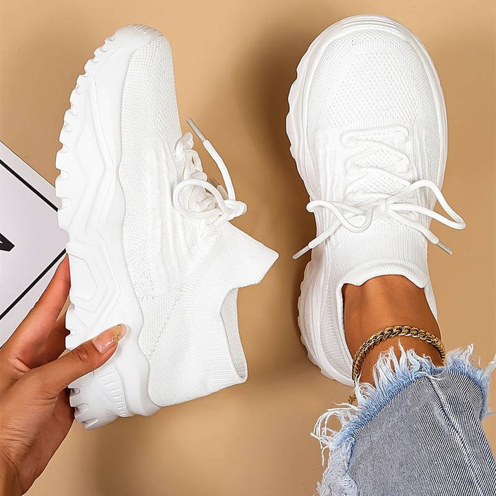 Stylish women's chunky sole casual sneakers with lace-up design for modern everyday comfort & trendy active wear.