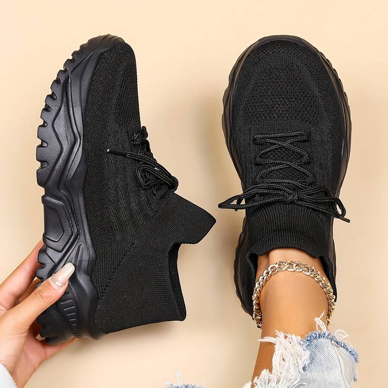Trendy women's casual sneakers featuring a chunky platform sole & secure lace-up for stylish, comfortable walking.