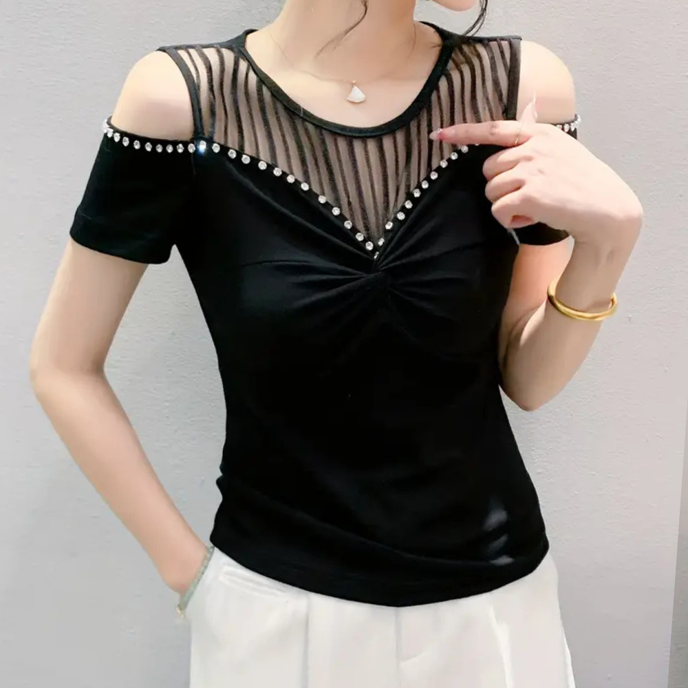 Comfortable red cold-shoulder top, a stylish blouse for women. Ideal for casual fashion.