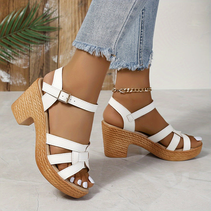 Chic open-toe women's wedge sandals, combining style & comfort for summer fashion.