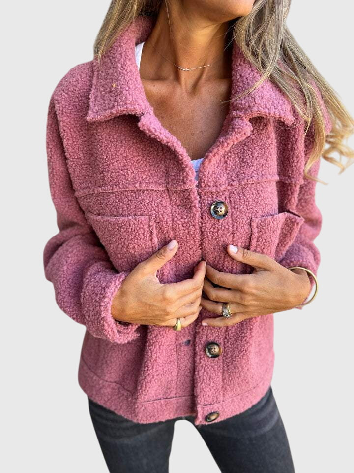 Elegant women's jacket for fall, a versatile coat with stylish details, ideal for various outdoor occasions.