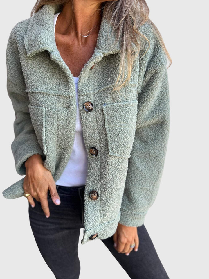 Fashionable women's seasonal jacket, designed as chic outerwear, offering both style and comfort for autumn.