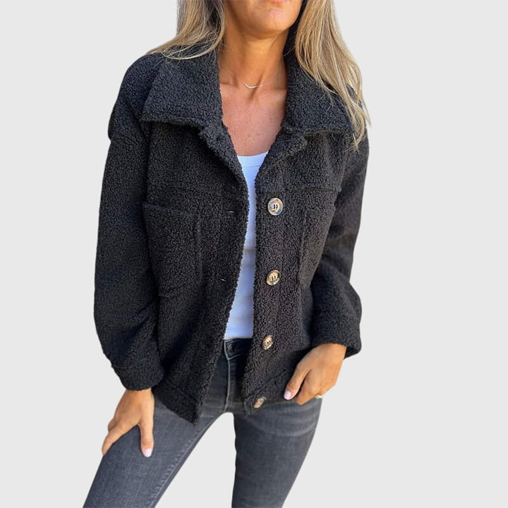 Versatile women's fall jacket featuring an elegant design and button details, a must-have for autumn fashion.