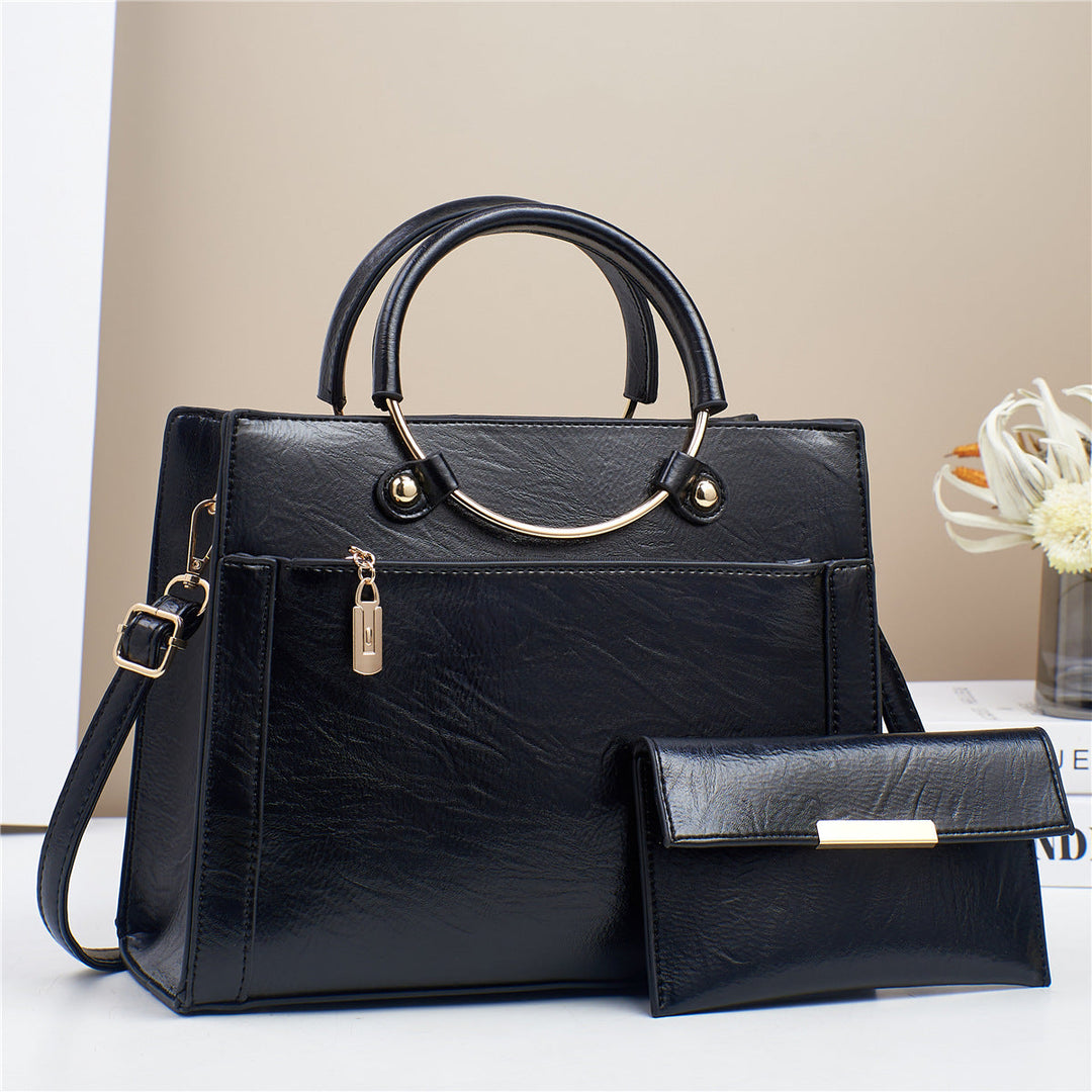 Durable faux leather women's everyday bag set: tote and small crossbody purse.