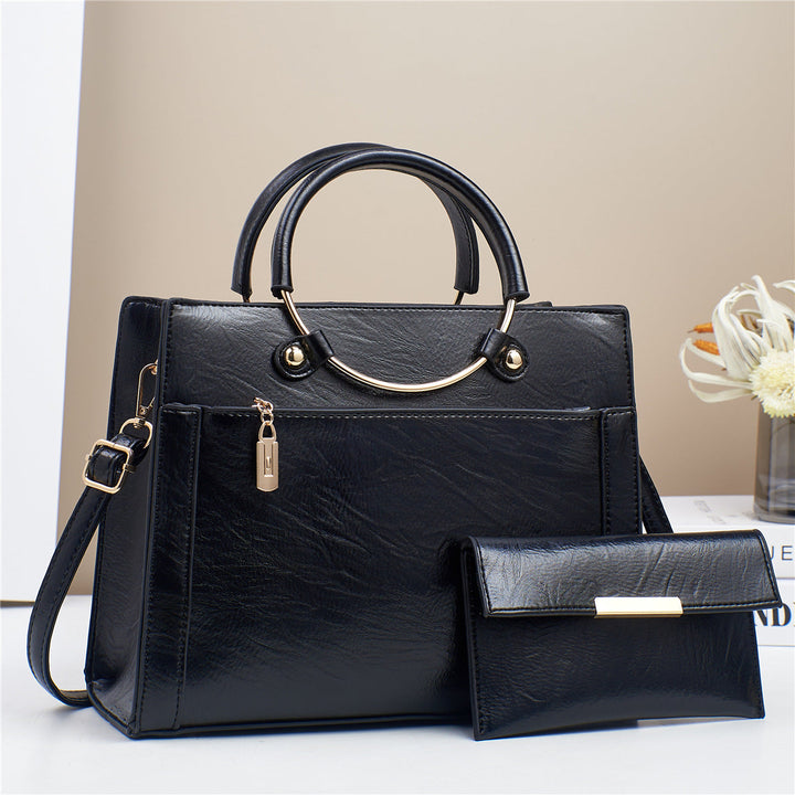 Durable faux leather women's everyday bag set: tote and small crossbody purse.