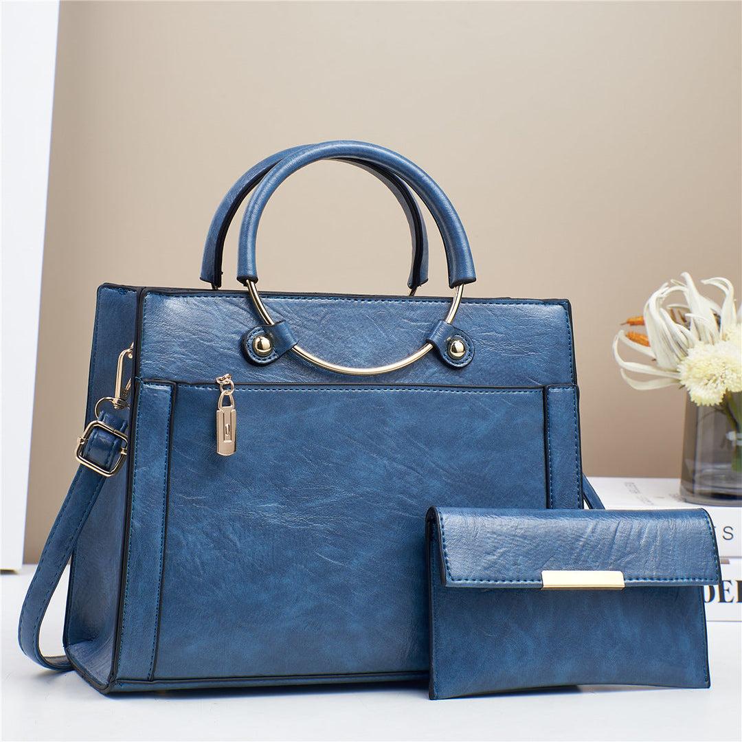 Organized women's fashion accessory: a stylish tote and a convenient crossbody bag.
