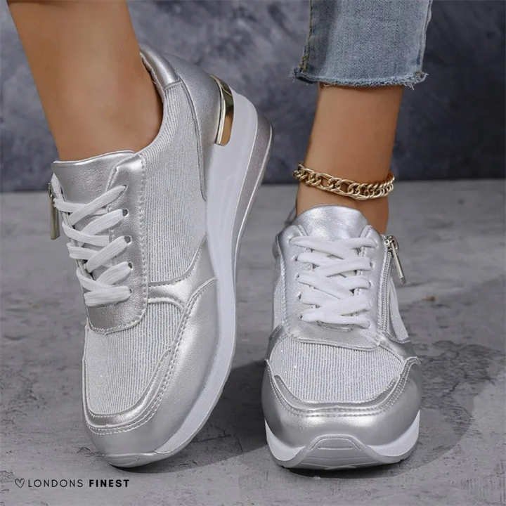 Lightweight women's Finley walking sneakers with advanced arch support & deep cushioning for ultimate comfort.