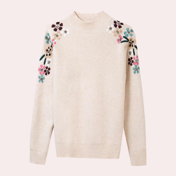 Warm long sleeve floral print women's sweater. Loose fit & cozy for autumn/winter fashion and comfort.