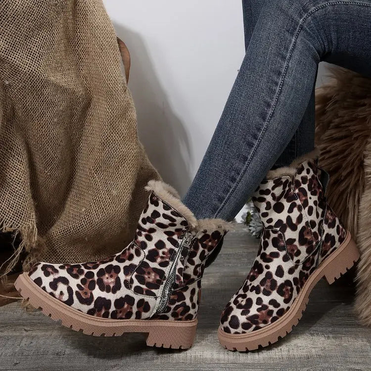 Elegant women's winter boots with luxurious fur lining and a sturdy construction for durability.
