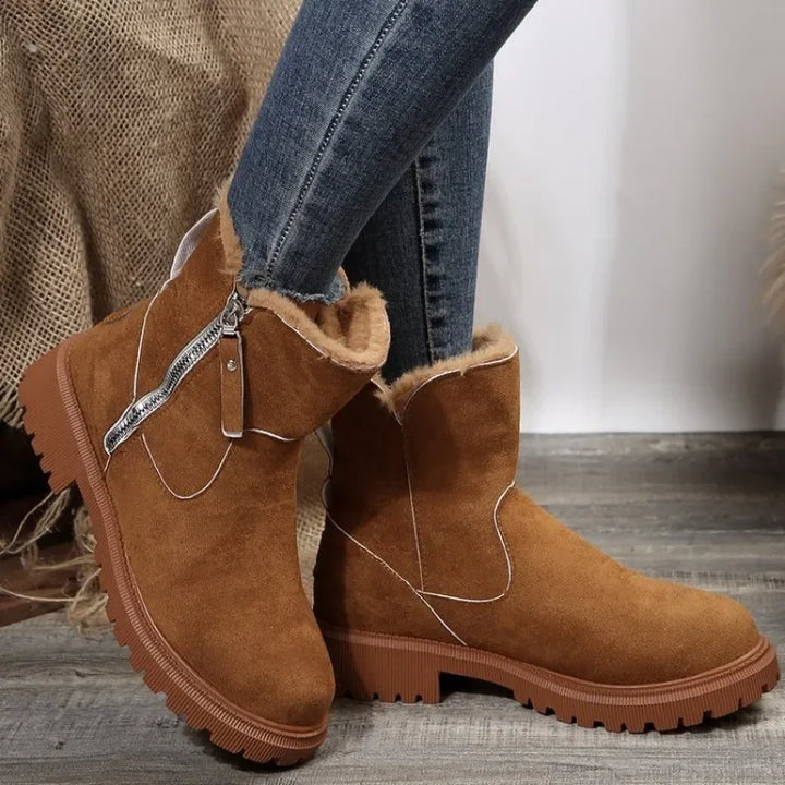 Side profile of women's warm fur-lined casual boots, highlighting the ankle fit.