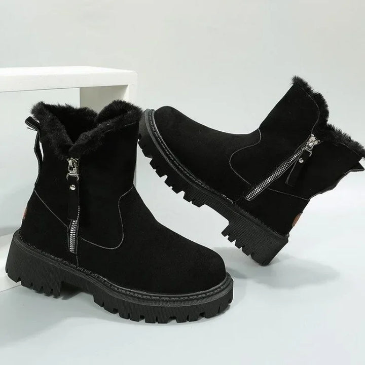 Close-up of the rugged sole on women's fur-lined winter boots for superior grip.