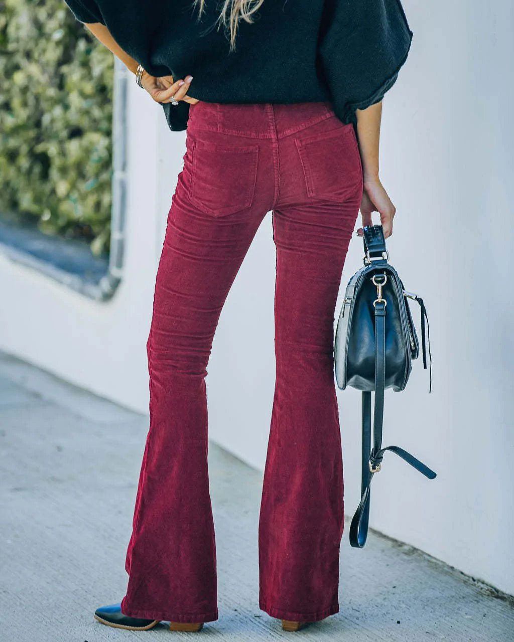 Trendy high waist flare pants for women, a must-have fashion bottom for a modern and stylish wardrobe.