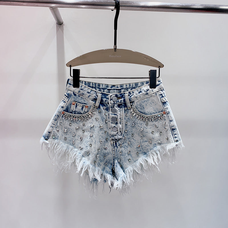Stylish women's high-waist shorts in light blue, perfect for summer casual wear. Comfortable and chic everyday apparel.