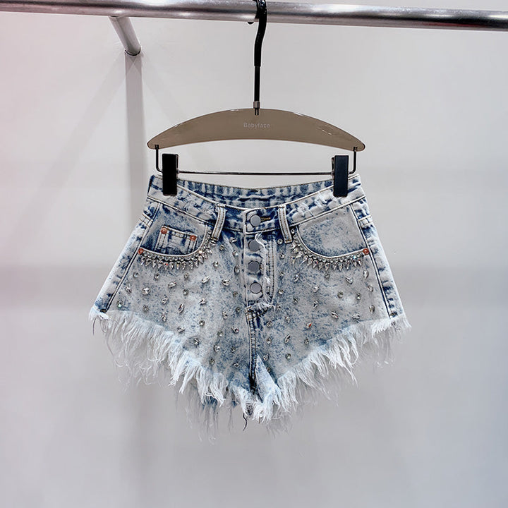 Stylish women's high-waist shorts in light blue, perfect for summer casual wear. Comfortable and chic everyday apparel.