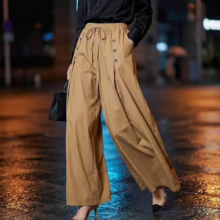 Stylish women's high-waisted wide leg pants with a flowing, relaxed fit. Perfect for casual chic summer outfits.