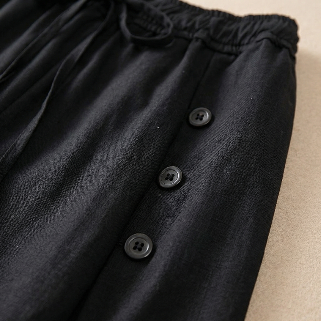 Versatile high-waisted wide leg pants for women. Flowing fabric and relaxed fit ensure stylish comfort.