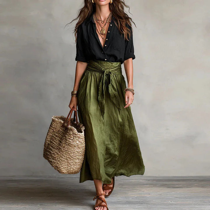 Jeanelle Women's long sleeve top & tie-waist skirt co-ord suit. A stylish two-piece set for versatile office attire.