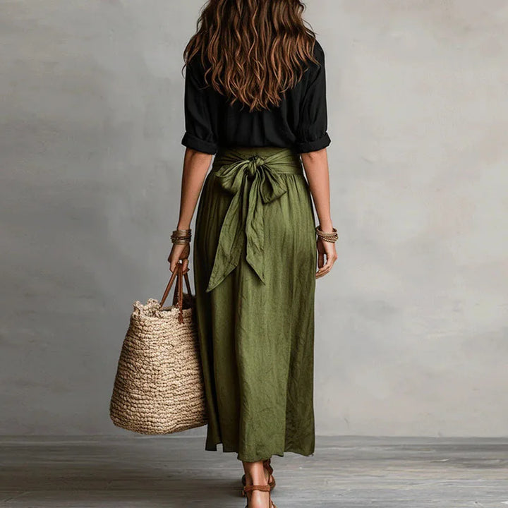 Women's Jeanelle Co-Ord Skirt Suit: long sleeve top and tie-waist skirt, a versatile and stylish two-piece outfit.
