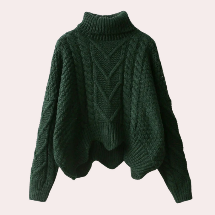 Close-up of a women's cozy knitted turtleneck sweater, showcasing texture, ideal for winter fashion.
