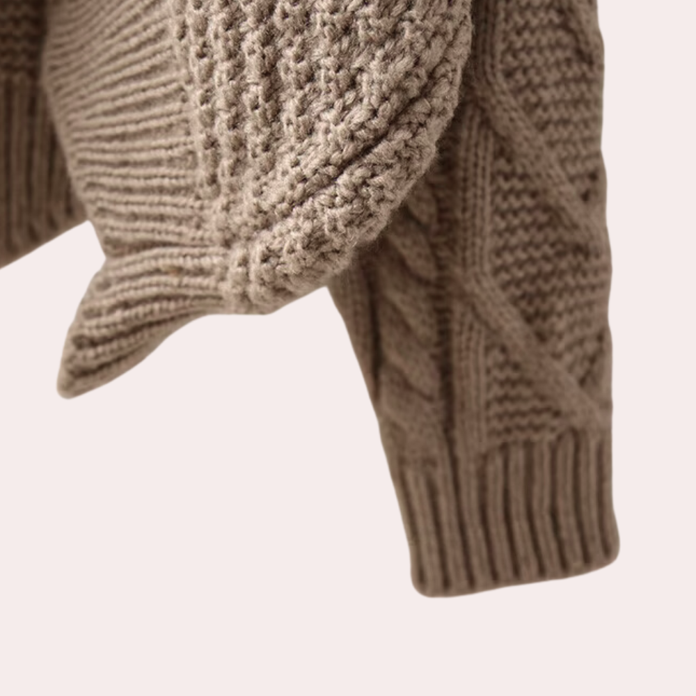 Modern women's knitted turtleneck sweater, offering a stylish silhouette and warmth for everyday wear.