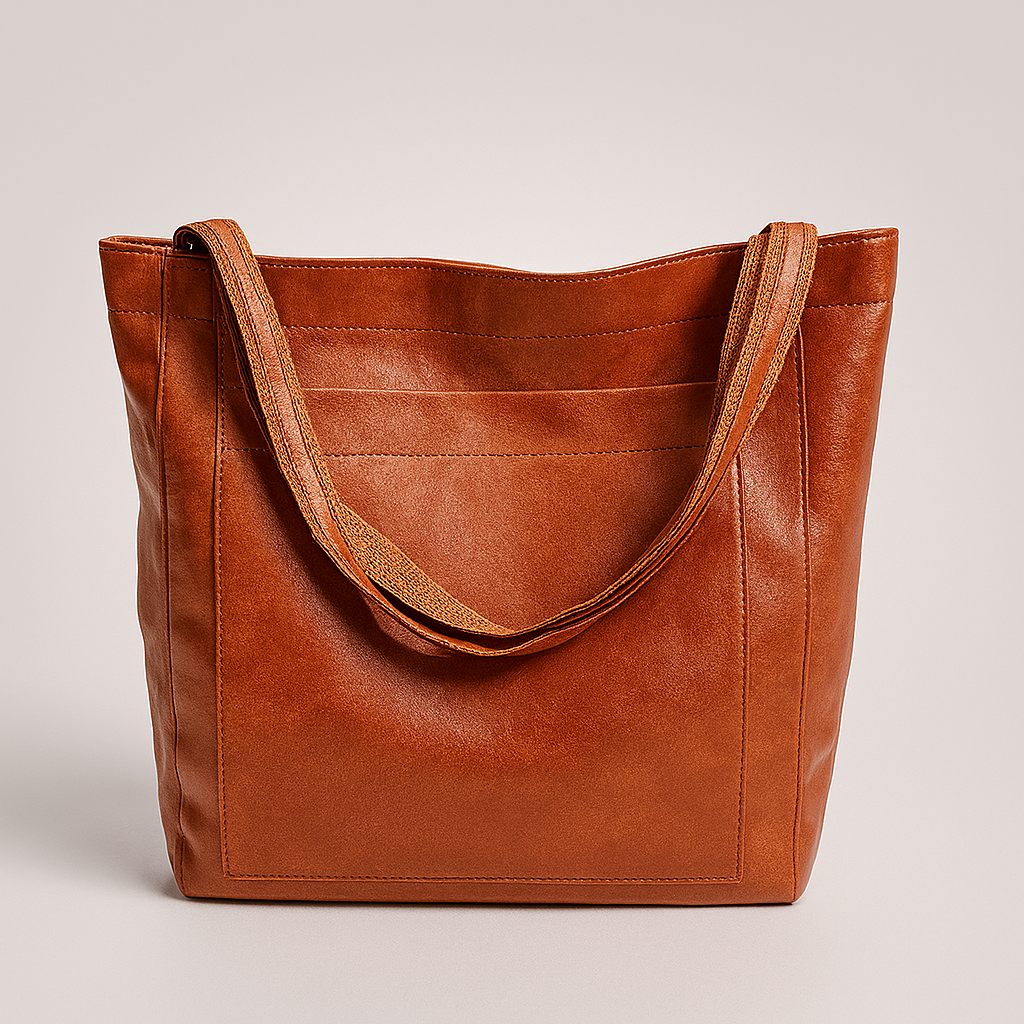 Stylish women's large tote shoulder bag with an exterior pocket, perfect for everyday use or commuting.