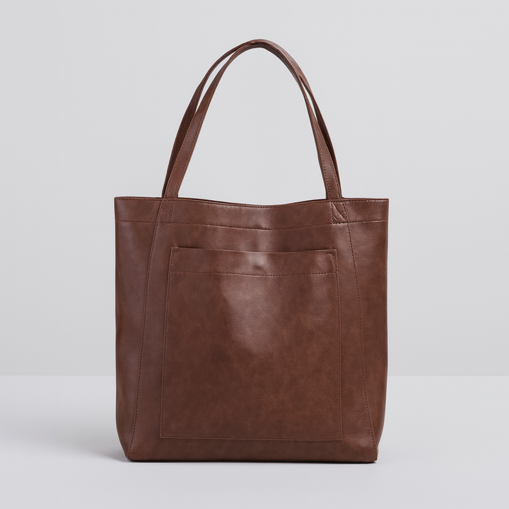 Chic women's large tote bag in coffee, a practical and stylish accessory with an exterior pocket for essentials.