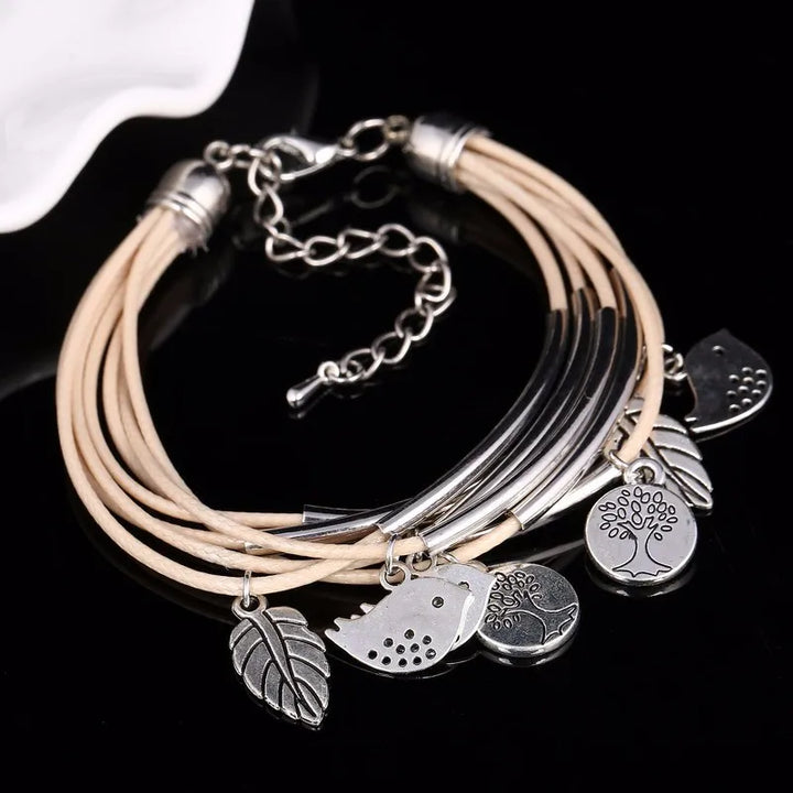 Casual layered beige leather bracelet, multi-strand women's accessory for everyday fashion.