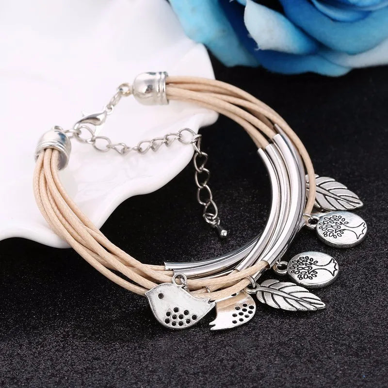 Stylish white layered leather bracelet, multi-strand women's jewelry with a secure clasp.