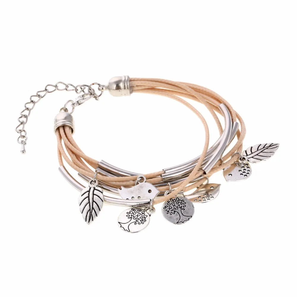 Fashionable women's beige layered multi-strand leather bracelet with magnetic closure.