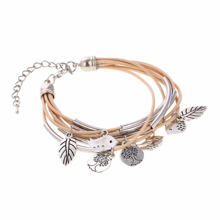 Fashionable women's beige layered multi-strand leather bracelet with magnetic closure.