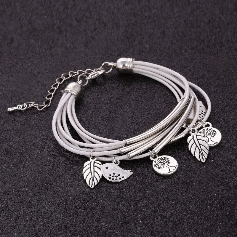 White layered natural leather bracelet, women's multi-strand jewelry with adjustable fit.