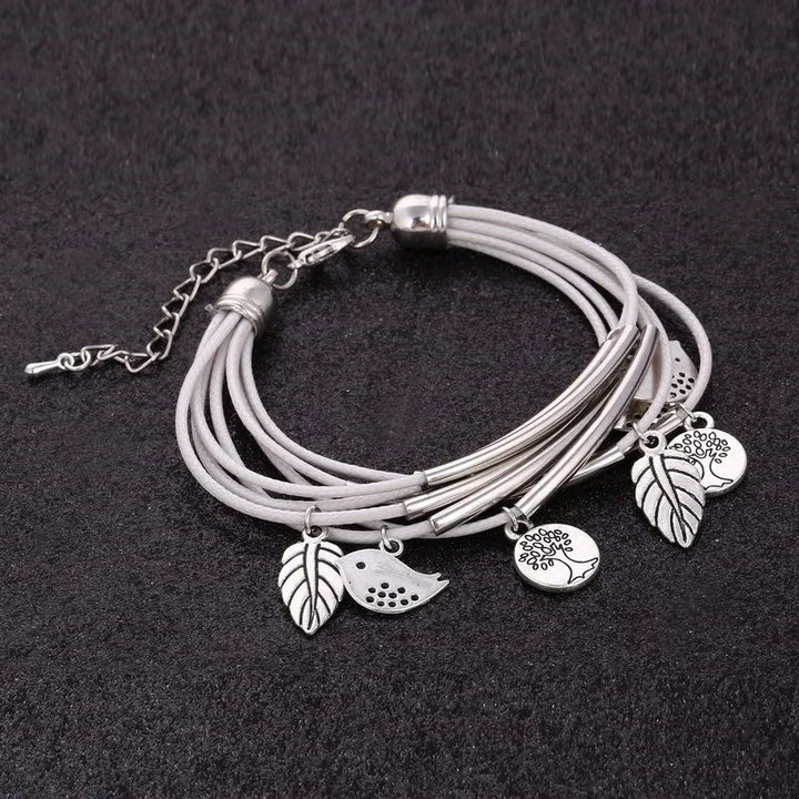 White layered natural leather bracelet, women's multi-strand jewelry with adjustable fit.